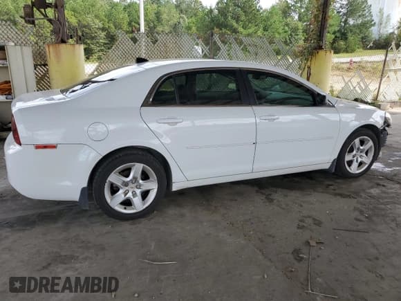 ✅ 2012 Chevrolet Malibu 1LS • VIN: 1G1ZB5E00CF225262 • Lot: 73627544. Listed on Copart with 119,992 mi. Free auction sales archive from the USA and detailed vehicle history report at DreamBid. Image 3.