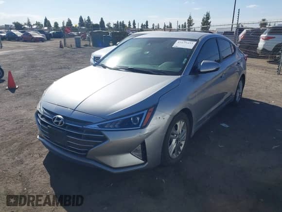2020 Hyundai Elantra SEL z VIN 5NPD84LF5LH597624, wystawiony jako IAAI lot #43175433 z przebiegiem 51 980 mil mil oraz . Historia ofert i sprzedaży dostępna na DreamBid. Obrazek 17.