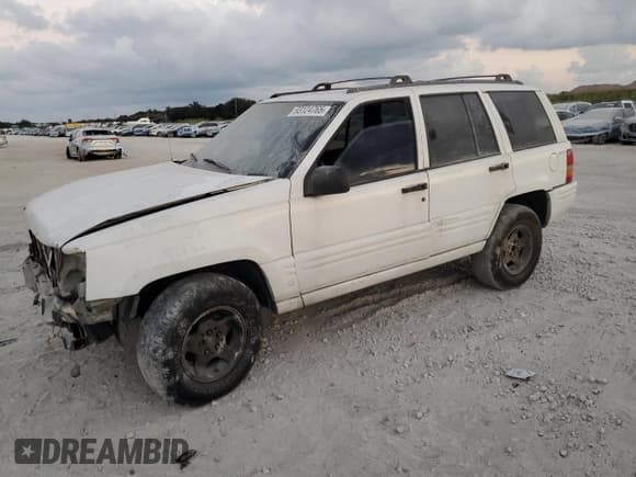 ✅ 1998 Jeep Grand Cherokee Laredo • VIN: 1J4GZ48S8WC313204 • Lot: 93124765. Listed on Copart with Not provided. Free auction sales archive from the USA and detailed vehicle history report at DreamBid. Image 1.