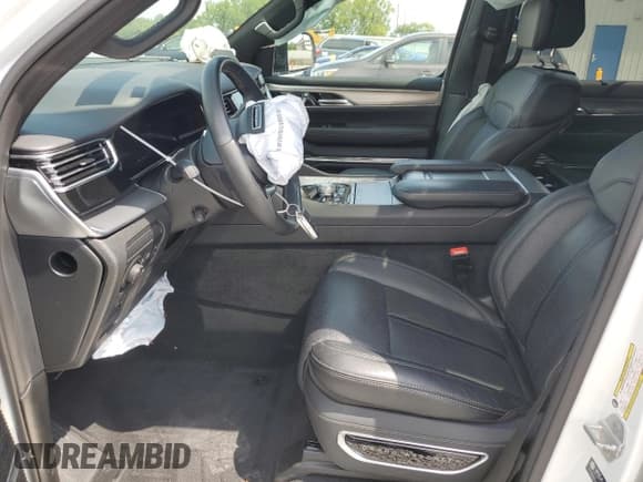 ✅ 2023 Jeep Grand Wagoneer • VIN: 1C4SJSEP2PS557840 • Лот: 69240965. Опубликован ранее на Copart с пробегом 37 285 миль. Бесплатный доступ к архиву аукционных продаж из США и подробный отчёт об истории автомобиля на DreamBid. Изображение 7.