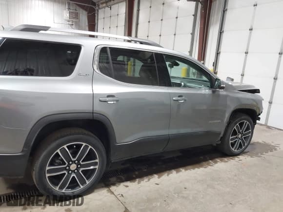 ✅ 2023 GMC Acadia SLT • VIN: 1GKKNULS1PZ191310 • Lot: 43578298. Listed on IAAI with 48,593 mi. Free auction sales archive from the USA and detailed vehicle history report at DreamBid. Image 14.