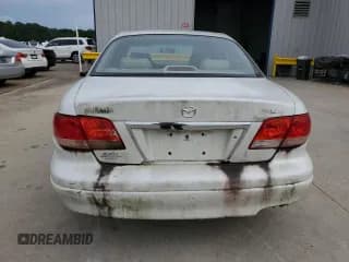 ✅ 2001 Mazda Millenia • VIN: JM1TA221911717066 • Lot: 63341244. Wystawiony na Copart z przebiegiem 234 263 mil. Bezpłatny archiwum sprzedaży aukcyjnych z USA i szczegółowy raport historii pojazdu na DreamBid. Zdjęcie 6.