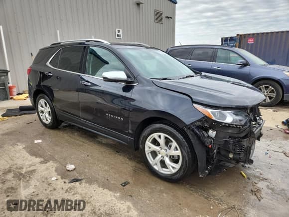 ✅ 2020 Chevrolet Equinox Premier • VIN: 2GNAXNEV8L6179022 • Lot: 91294675. Wystawiony na Copart z przebiegiem 149 086 mil. Bezpłatny archiwum sprzedaży aukcyjnych z USA i szczegółowy raport historii pojazdu na DreamBid. Zdjęcie 4.