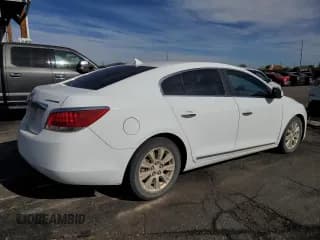 ✅ 2010 Buick LaCrosse CX • VIN: 1G4GB5EGXAF320979 • Лот: 91396635. Опубликован ранее на Copart с пробегом 149 291 миль. Бесплатный доступ к архиву аукционных продаж из США и подробный отчёт об истории автомобиля на DreamBid. Изображение 3.