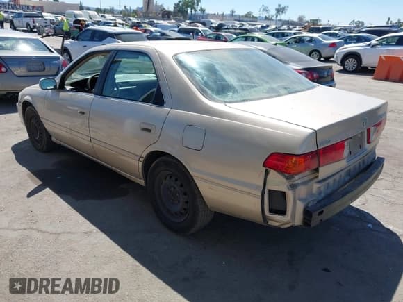 ✅ 2000 Toyota Camry CE • VIN: JT2BG22K2Y0424718 • Lot: 43158770. Listed on IAAI with 280,939 mi. Free auction sales archive from the USA and detailed vehicle history report at DreamBid. Image 3.