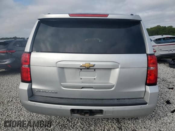 2015 Chevrolet Suburban LT with VIN 1GNSKJKC9FR147607, listed as a Copart auction lot 82344395 with 164,883 mi miles and Salvage title. Bid and sale history available at DreamBid. Image 6.