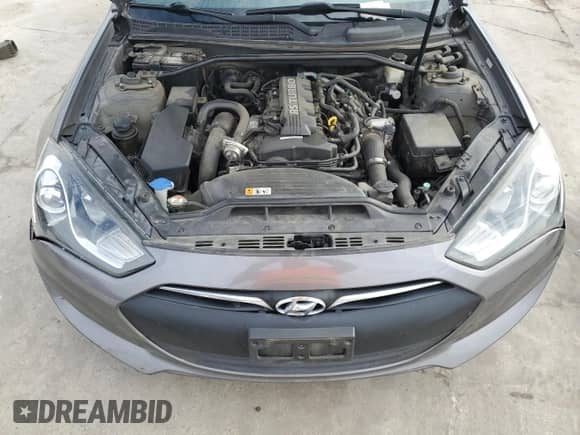 2013 Hyundai Genesis Coupe Premium с VIN KMHHT6KDXDU084769, выставлен на аукционе Copart как лот 83674074 с пробегом 77 900 миль миль и Списание • Salvage title. История ставок и продаж доступна на DreamBid. Изображение 11.