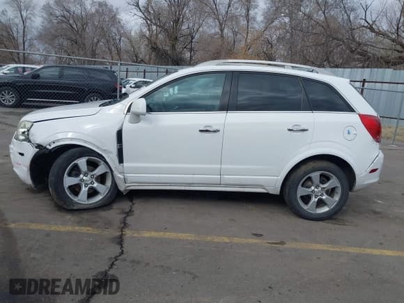 ✅ 2014 Chevrolet Captiva Sport LTZ • VIN: 3GNAL4EK8ES631051 • Lot: 41721041. Wystawiony na IAAI z przebiegiem 140 258 mil. Bezpłatny archiwum sprzedaży aukcyjnych z USA i szczegółowy raport historii pojazdu na DreamBid. Zdjęcie 14.