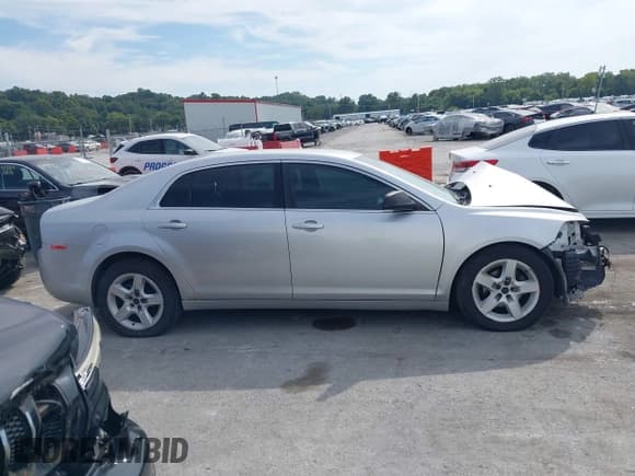 ✅ 2010 Chevrolet Malibu 1FL • VIN: 1G1ZA5E09AF278431 • Lot: 43355679. Listed on IAAI with 165,370 mi. Free auction sales archive from the USA and detailed vehicle history report at DreamBid. Image 13.
