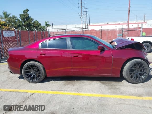 ✅ 2020 Dodge Charger SXT • VIN: 2C3CDXBGXLH136791 • Lot: 43348347. Listed on IAAI with 74,564 mi. Free auction sales archive from the USA and detailed vehicle history report at DreamBid. Image 13.