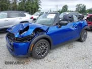 ✅ 2025 MINI Convertible Cooper S • VIN: WMW23GX01S2X08664 • Lot: 42506008. Listed on IAAI with 1,641 mi. Free auction sales archive from the USA and detailed vehicle history report at DreamBid. Image 2.