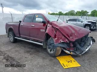 ✅ 2016 Ram 1500 Laramie • VIN: 1C6RR7VT1GS402706 • Lot: 42278633. Listed on IAAI with 165,027 mi. Free auction sales archive from the USA and detailed vehicle history report at DreamBid. Image 1.