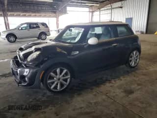 2014 MINI Hardtop S with VIN WMWXM7C52ET926552, listed as a Copart auction lot 89899835 with 77,077 mi miles and Salvage title. Bid and sale history available at DreamBid. Image 1.
