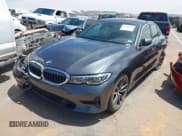 ✅ 2020 BMW 3 Series 330i • VIN: 3MW5R1J07L8B25648 • Lot: 42130052. Listed on IAAI with 64,662 mi. Free auction sales archive from the USA and detailed vehicle history report at DreamBid. Image 2.