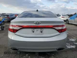 2013 Hyundai Azera z VIN KMHFH4JG5DA300781, wystawiony jako Copart lot #42493805 z przebiegiem 165 673 mil mil oraz Szkoda całkowita • Salvage title. Historia ofert i sprzedaży dostępna na DreamBid. Obrazek 6.