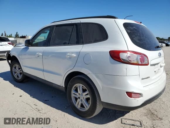 ✅ 2012 Hyundai Santa Fe GLS • VIN: 5XYZG3AB3CG100841 • Lot: 87966315. Listed on Copart with 215,253 mi. Free auction sales archive from the USA and detailed vehicle history report at DreamBid. Image 2.