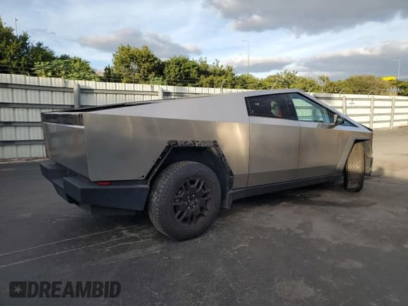 ✅ 2024 Tesla Cybertruck • VIN: 7G2CEHEDXRA019561 • Lot: 91157085. Listed on Copart with 11,535 mi. Free auction sales archive from the USA and detailed vehicle history report at DreamBid. Image 3.