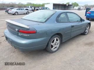 ✅ 1999 Dodge Avenger ES • VIN: 4B3AU52N7XE079985 • Lot: 41935923. Listed on IAAI with 212,968 mi. Free auction sales archive from the USA and detailed vehicle history report at DreamBid. Image 4.