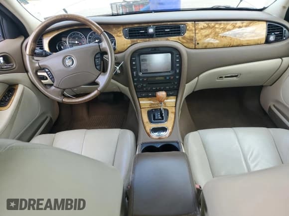 ✅ 2006 Jaguar S-Type 3 • VIN: SAJWA01A36FN55417 • Лот: 81747855. Опубликован ранее на Copart с пробегом 105 005 миль. Бесплатный доступ к архиву аукционных продаж из США и подробный отчёт об истории автомобиля на DreamBid. Изображение 8.