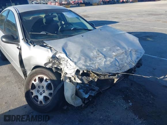 2005 Dodge Neon SXT z VIN 1B3ES56C15D107316, wystawiony jako IAAI lot #41862360 z przebiegiem 408 209 mil mil oraz . Historia ofert i sprzedaży dostępna na DreamBid. Obrazek 6.