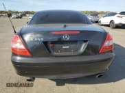 ✅ 2005 Mercedes-Benz SLK 230/320 • VIN: WDBWK56F95F047804 • Лот: 77909684. Опубликован ранее на Copart с пробегом 136 569 миль. Бесплатный доступ к архиву аукционных продаж из США и подробный отчёт об истории автомобиля на DreamBid. Изображение 6.