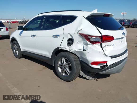 2018 Hyundai Santa Fe 2.4L с VIN 5XYZU3LB5JG542605, выставлен на аукционе IAAI как лот 43539148 с пробегом 18 839 миль миль и . История ставок и продаж доступна на DreamBid. Изображение 3.