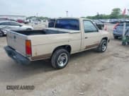 ✅ 1986 Nissan Hardbody E • VIN: JN6ND11S0GW000696 • Lot: 42358321. Listed on IAAI with 445,199 mi. Free auction sales archive from the USA and detailed vehicle history report at DreamBid. Image 4.