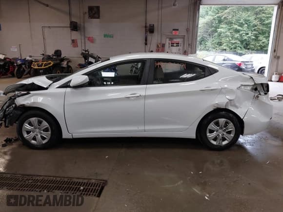 ✅ 2016 Hyundai Elantra SE • VIN: 5NPDH4AE2GH727178 • Lot: 43036671. Listed on IAAI with 102,310 mi. Free auction sales archive from the USA and detailed vehicle history report at DreamBid. Image 15.