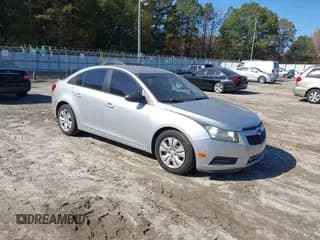✅ 2013 Chevrolet Cruze LS • VIN: 1G1PA5SH0D7259573 • Lot: 43613680. Listed on IAAI with 146,199 mi. Free auction sales archive from the USA and detailed vehicle history report at DreamBid. Image 1.