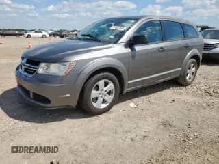 2013 Dodge Journey American Value with VIN 3C4PDCAB5DT557077, listed as a Copart auction lot 71607065 with 134,370 mi miles and Salvage title. Bid and sale history available at DreamBid. Image 1.