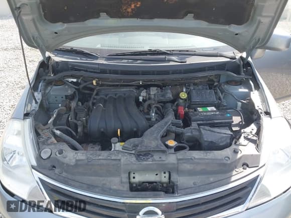 ✅ 2012 Nissan Versa S • VIN: 3N1BC1CP0CK264821 • Lot: 43232508. Listed on IAAI with 128,428 mi. Free auction sales archive from the USA and detailed vehicle history report at DreamBid. Image 10.