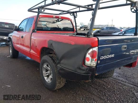 2002 Dodge Dakota SLT with VIN 1B7GL42N52S505626, listed as a IAAI auction lot 41552396 with 255,927 mi miles and . Bid and sale history available at DreamBid. Image 3.