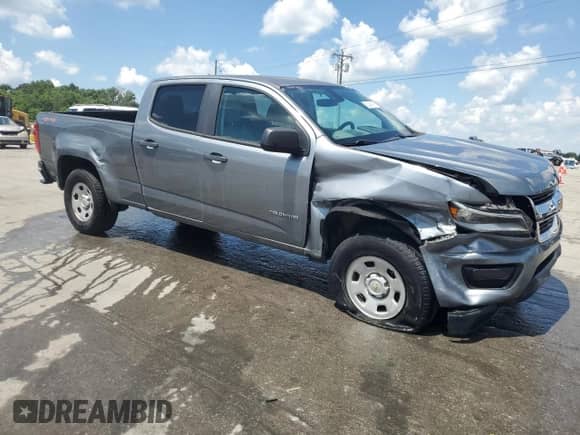 2018 Chevrolet Colorado 4WD Work Truck with VIN 1GCGTBEN2J1255024, listed as a Copart auction lot 63489795 with 60,015 mi miles and Salvage title. Bid and sale history available at DreamBid. Image 4.
