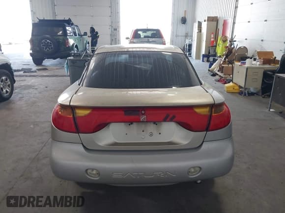 ✅ 2001 Saturn SC • VIN: 1G8ZP12841Z300417 • Лот: 42731965. Опубликован ранее на IAAI с пробегом 151 041 миль. Бесплатный доступ к архиву аукционных продаж из США и подробный отчёт об истории автомобиля на DreamBid. Изображение 16.