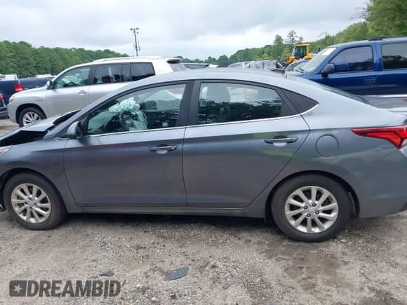 2019 Hyundai Accent SE with VIN 3KPC24A3XKE066993, listed as a IAAI auction lot 42893306 with 91,131 mi miles and . Bid and sale history available at DreamBid. Image 14.