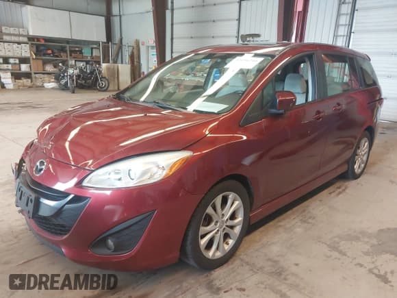 ✅ 2012 Mazda 5 Touring • VIN: JM1CW2CL3C0136544 • Lot: 42696240. Listed on IAAI with 77,400 mi. Free auction sales archive from the USA and detailed vehicle history report at DreamBid. Image 2.