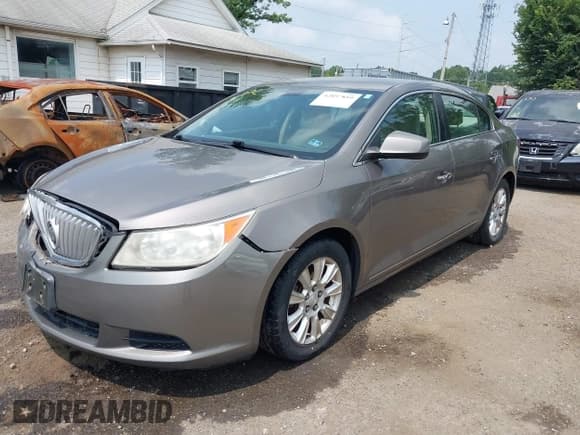 ✅ 2012 Buick LaCrosse • VIN: 1G4GA5ER4CF242450 • Lot: 42897859. Listed on IAAI with 178,899 mi. Free auction sales archive from the USA and detailed vehicle history report at DreamBid. Image 2.