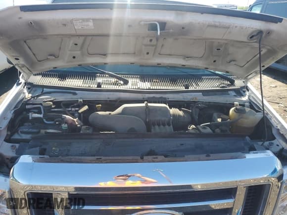 ✅ 2014 Ford Econoline Passenger XL • VIN: 1FBNE3BL9EDA93766 • Лот: 57099235. Опубликован ранее на Copart с пробегом 133 512 миль. Бесплатный доступ к архиву аукционных продаж из США и подробный отчёт об истории автомобиля на DreamBid. Изображение 12.