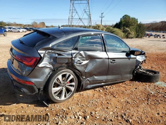 ✅ 2023 Audi SQ5 Sportback Premium Plus • VIN: WA124AFYXP2106254 • Лот: 79646994. Опубликован ранее на Copart с пробегом 22 345 миль. Бесплатный доступ к архиву аукционных продаж из США и подробный отчёт об истории автомобиля на DreamBid. Изображение 3.