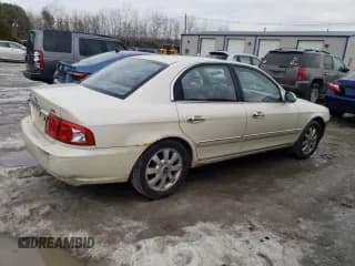 ✅ 2004 Kia Optima LX • VIN: KNAGD128445305177 • Лот: 46150285. Опубликован ранее на Copart с пробегом 128 279 миль. Бесплатный доступ к архиву аукционных продаж из США и подробный отчёт об истории автомобиля на DreamBid. Изображение 3.