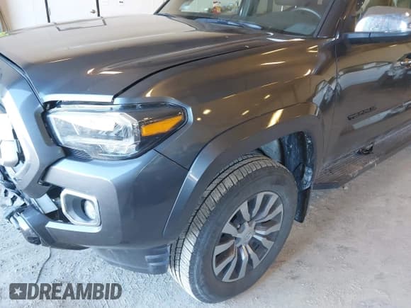 ✅ 2020 Toyota Tacoma Limited • VIN: 3TMGZ5ANXLM357019 • Лот: 43408926. Опубликован ранее на IAAI с пробегом 28 612 миль. Бесплатный доступ к архиву аукционных продаж из США и подробный отчёт об истории автомобиля на DreamBid. Изображение 6.