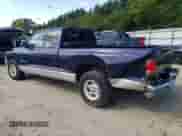 1999 Dodge Dakota SLT z VIN 1B7GL22X6XS225162, wystawiony jako Copart lot #74579884 z przebiegiem 162 714 mil mil oraz Czysty tytuł • Clean title. Historia ofert i sprzedaży dostępna na DreamBid. Obrazek 2.
