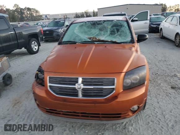 ✅ 2011 Dodge Caliber Heat • VIN: 1B3CB5HA2BD294788 • Лот: 76325214. Опубликован ранее на Copart с пробегом 107 967 миль. Бесплатный доступ к архиву аукционных продаж из США и подробный отчёт об истории автомобиля на DreamBid. Изображение 5.