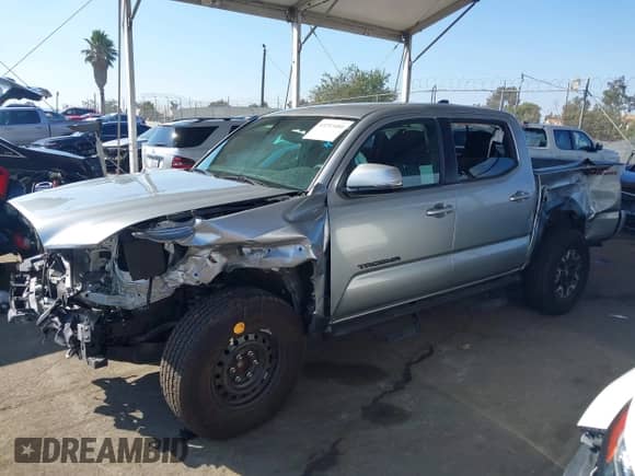 2022 Toyota Tacoma SR5 with VIN 3TMAZ5CN9NM186656, listed as a IAAI auction lot 43253480 with 25,540 mi miles and . Bid and sale history available at DreamBid. Image 22.