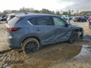 ✅ 2023 Mazda CX-5 S Preferred • VIN: JM3KFBCM9P0125954 • Lot: 94697375. Listed on Copart with 60,390 mi. Free auction sales archive from the USA and detailed vehicle history report at DreamBid. Image 3.