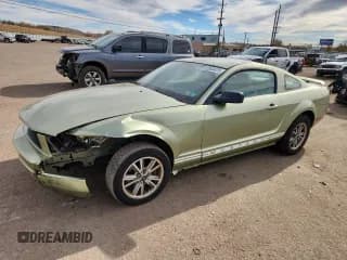 ✅ 2005 Ford Mustang Deluxe • VIN: 1ZVFT80N655220164 • Lot: 92504475. Listed on Copart with 128,294 mi. Free auction sales archive from the USA and detailed vehicle history report at DreamBid. Image 1.