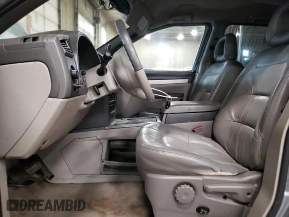 ✅ 2003 Buick Rendezvous CXL • VIN: 3G5DB03E43S598147 • Лот: 80659204. Опубликован ранее на Copart с пробегом 155 641 миль. Бесплатный доступ к архиву аукционных продаж из США и подробный отчёт об истории автомобиля на DreamBid. Изображение 7.