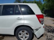 ✅ 2012 Suzuki Grand Vitara Premium • VIN: JS3TE0D67C4100186 • Lot: 42862856. Listed on IAAI with 133,573 mi. Free auction sales archive from the USA and detailed vehicle history report at DreamBid. Image 12.