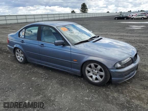 1999 BMW 3 Series 323i with VIN WBAAM3333XKC57572, listed as a Copart auction lot 57478895 with 177,561 mi miles and Salvage title. Bid and sale history available at DreamBid. Image 4.