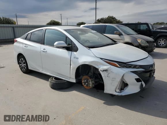 ✅ 2022 Toyota Prius LE • VIN: JTDKAMFP1N3218133 • Lot: 87238735. Wystawiony na Copart z przebiegiem 30 357 mil. Bezpłatny archiwum sprzedaży aukcyjnych z USA i szczegółowy raport historii pojazdu na DreamBid. Zdjęcie 4.